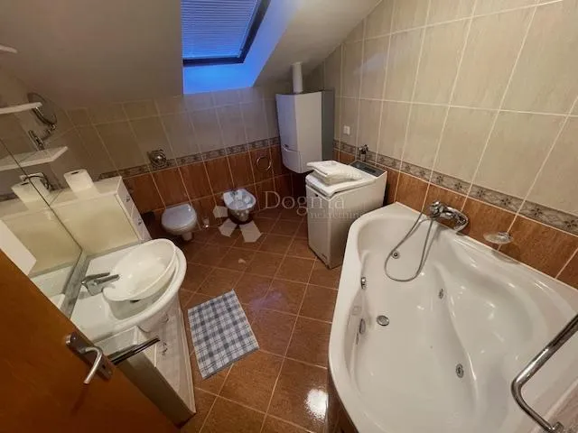 stan u neposrednoj blizini novog hotela s garažom - slika 14