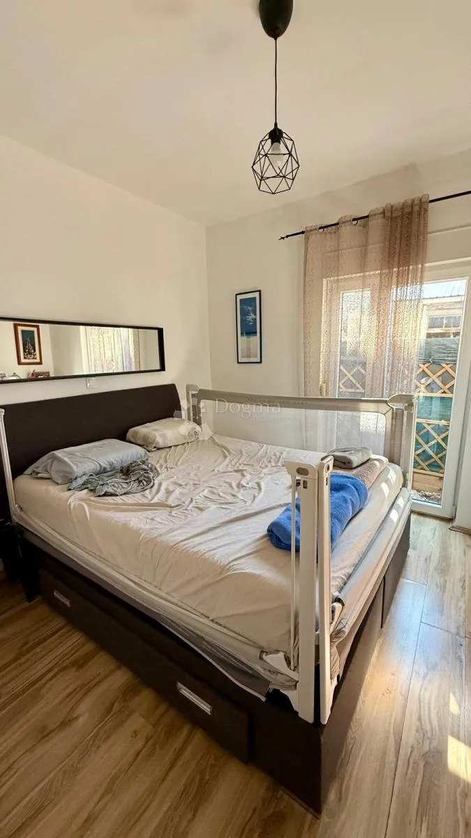 uredan dvosoban stan 55,03 m² u mirnoj zgradi s tri stana - slika 11