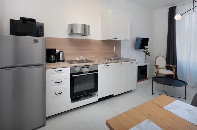 centar -60m2,2s+db kompletno adaptiran - slika 1