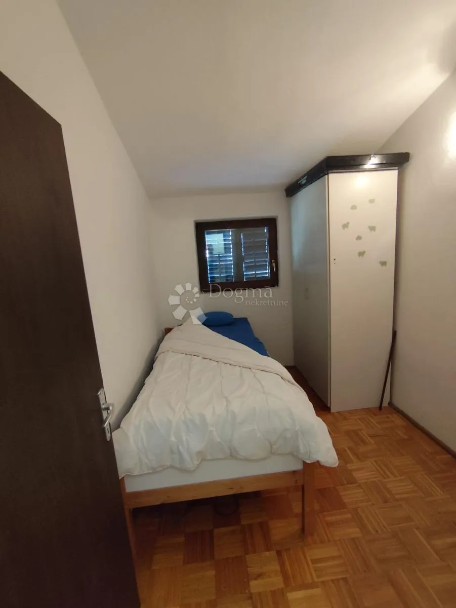 kuća u centru jezera - slika 5