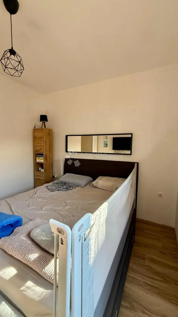 uredan dvosoban stan 55,03 m² u mirnoj zgradi s tri stana - slika 10