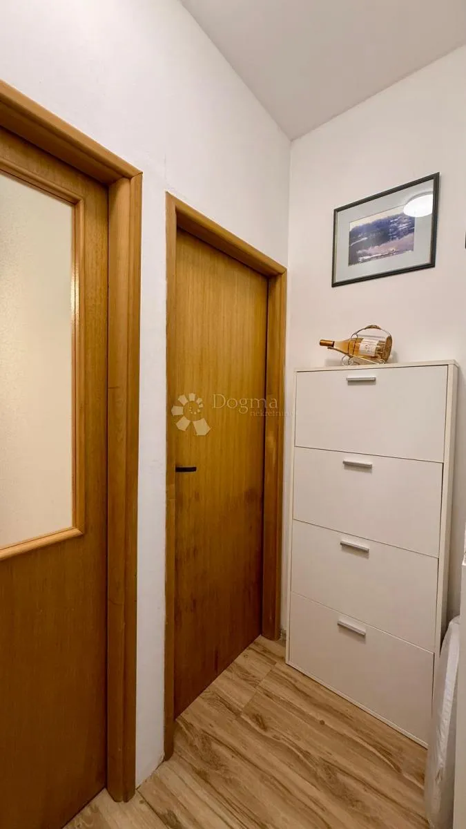 uredan dvosoban stan 55,03 m² u mirnoj zgradi s tri stana - slika 9