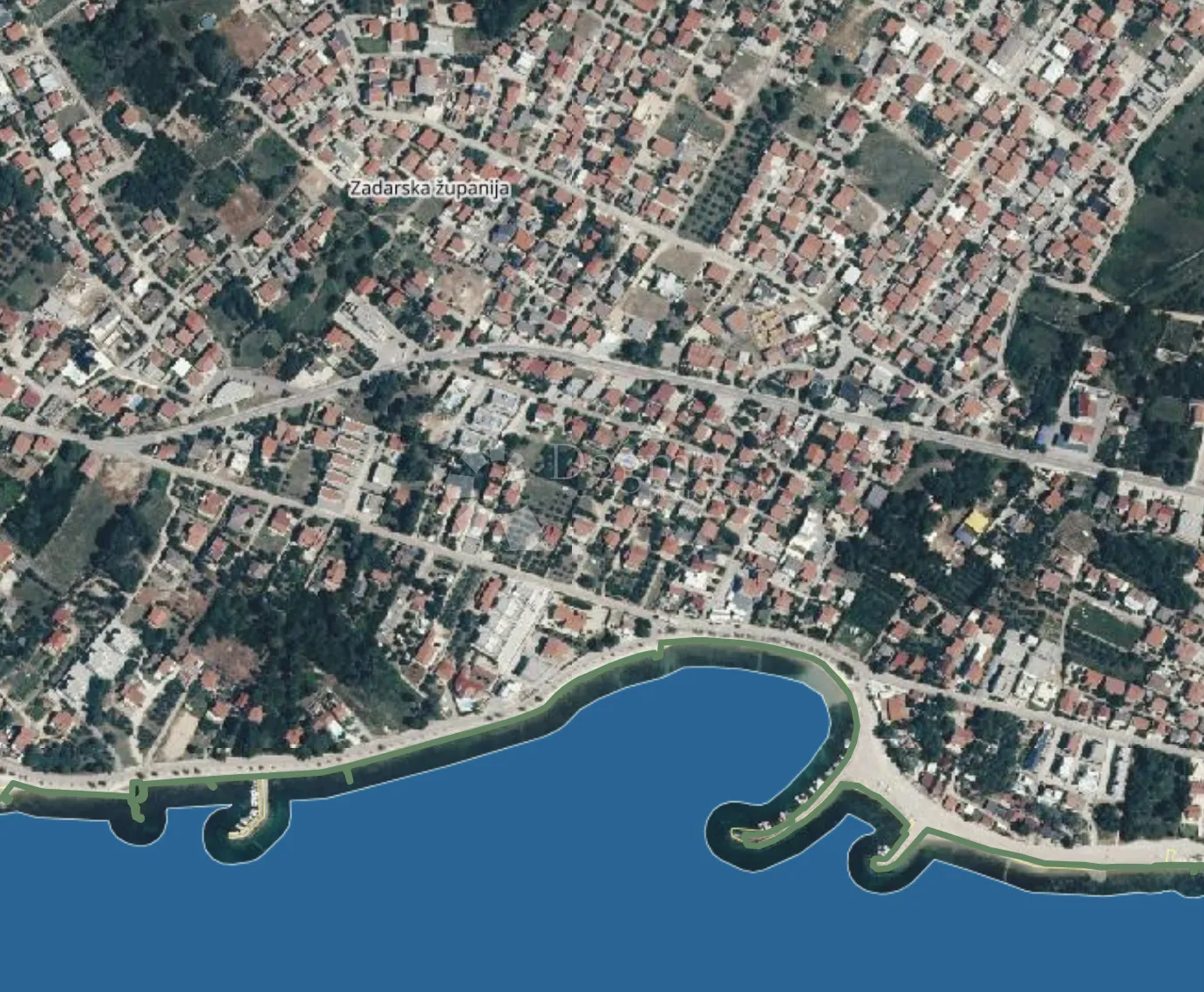Parcela s građ. dozvolom i projektom – blizu centra Vira, 150m od mora