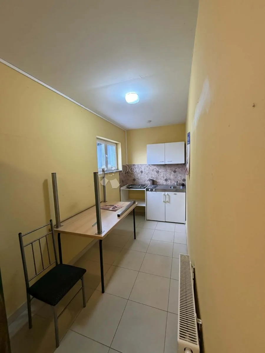 poslovno stambena zgrada - permani - slika 11