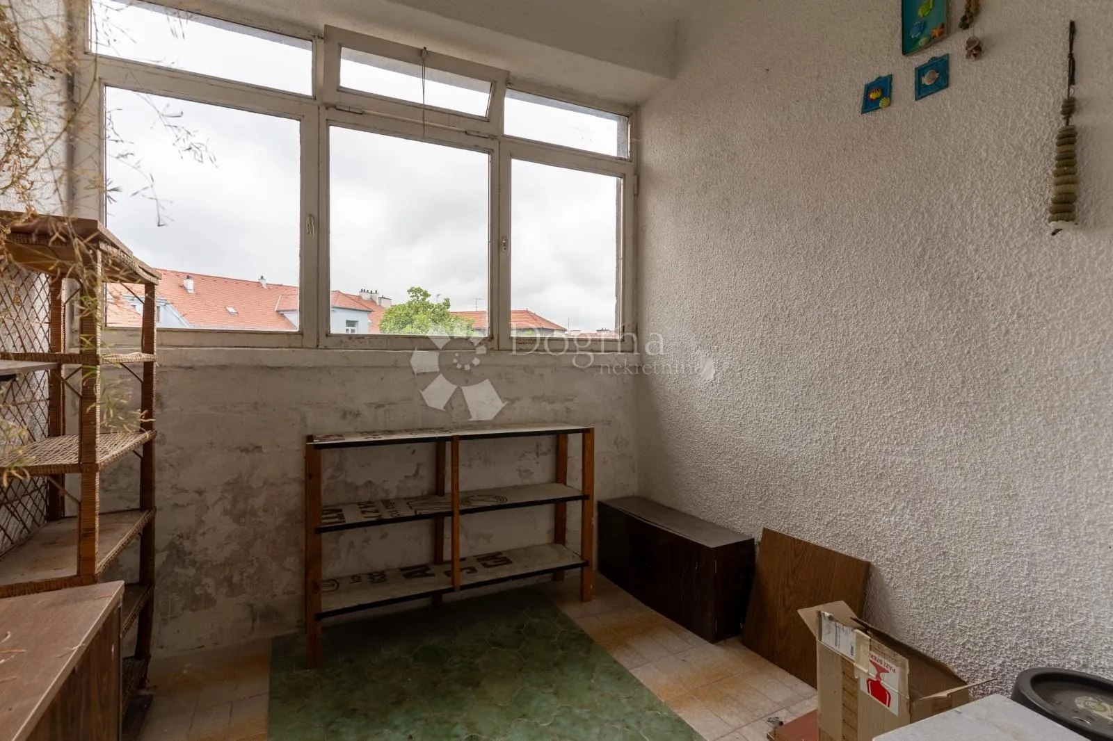 centar grada, petorosoban stan s potencijalom - slika 10