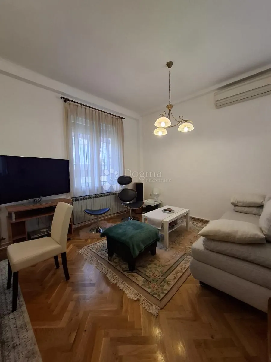 prostran 4s stan u širem centru – idealno za najam - slika 4