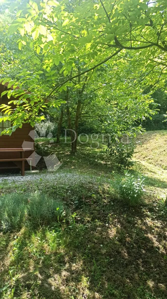 zemljište sa kućicom i spremištem, te wc-om nadomak zaboka - slika 56