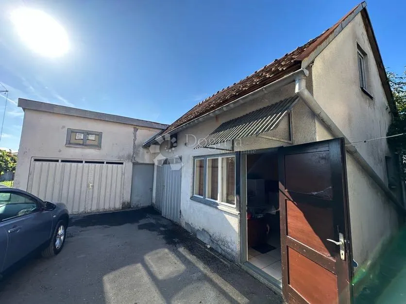 centar grada, kuća, 2 pomoćna objekta, plus 2000m2 građevinskog zemljišta - slika 5