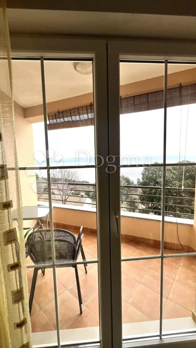 kuća sa 4 stana-pogled more i građevinska parcela - slika 47