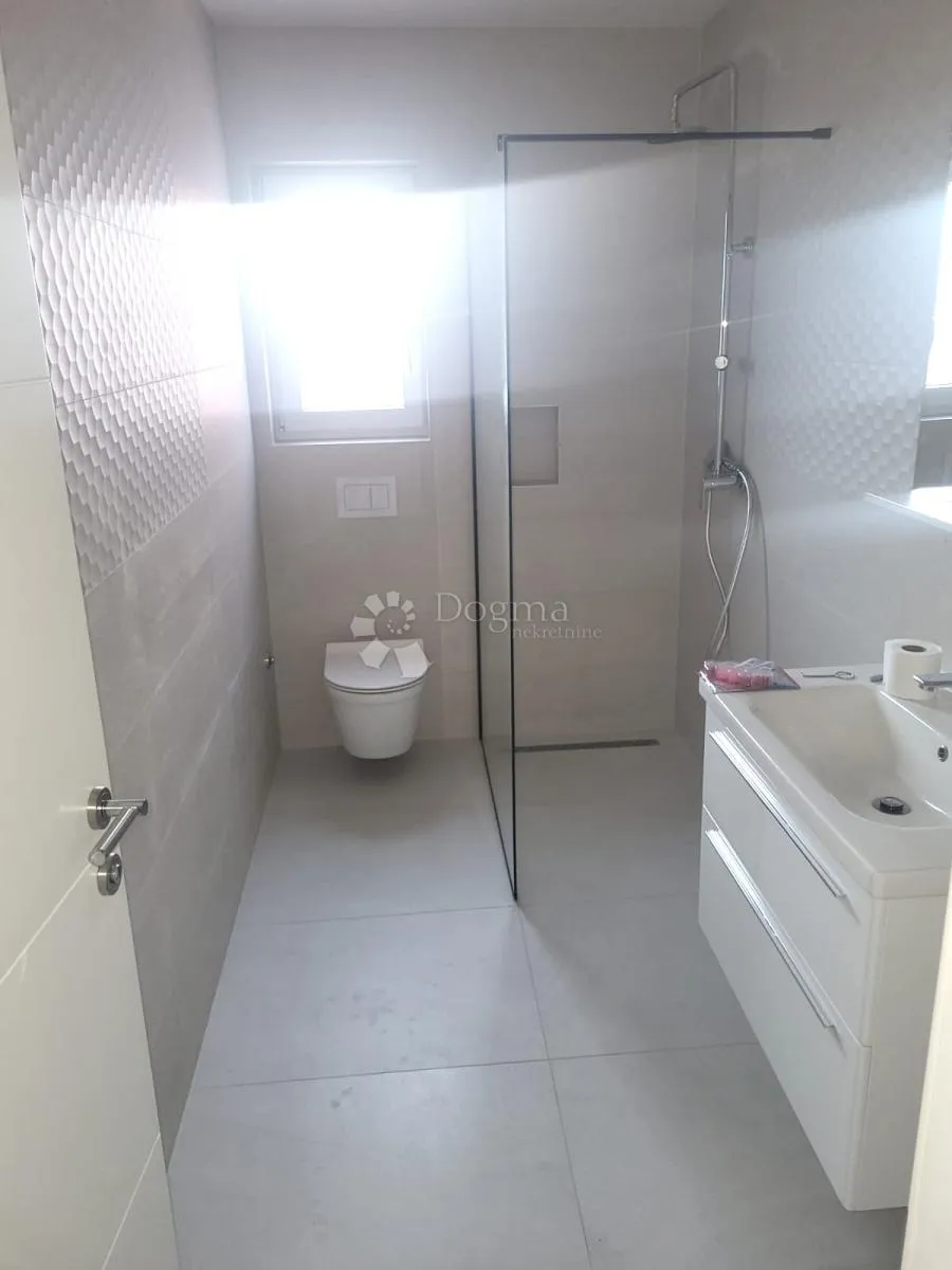 sofisticirana kuća - novogradnja s tri kategorizirana apartmana - slika 7
