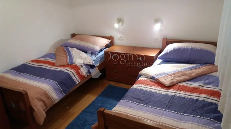 kuća sa 2 stana i prostranom građevinskom okućnicom - slika 17