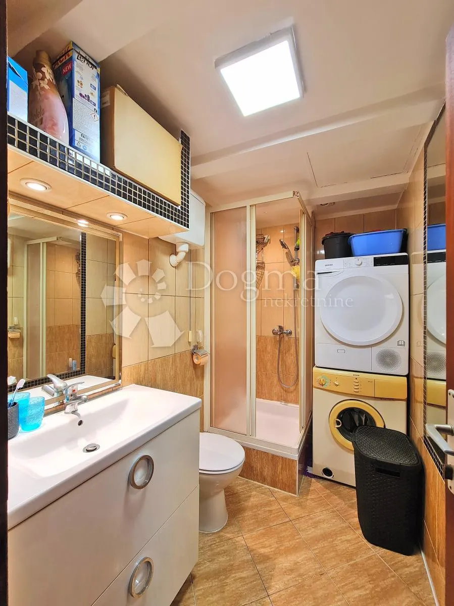 tri apartmana u srcu grada - slika 26