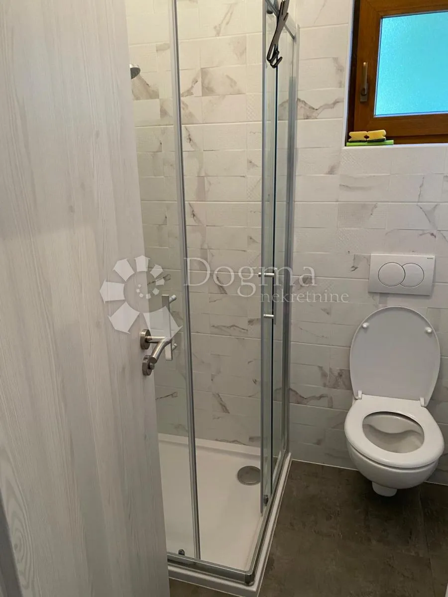 apartman u prizemlju, 2s+db, sa okućnicom i parkingom - slika 9