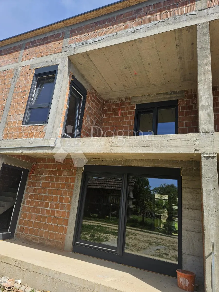 dvoetažni stan u novogradnji - slika 6