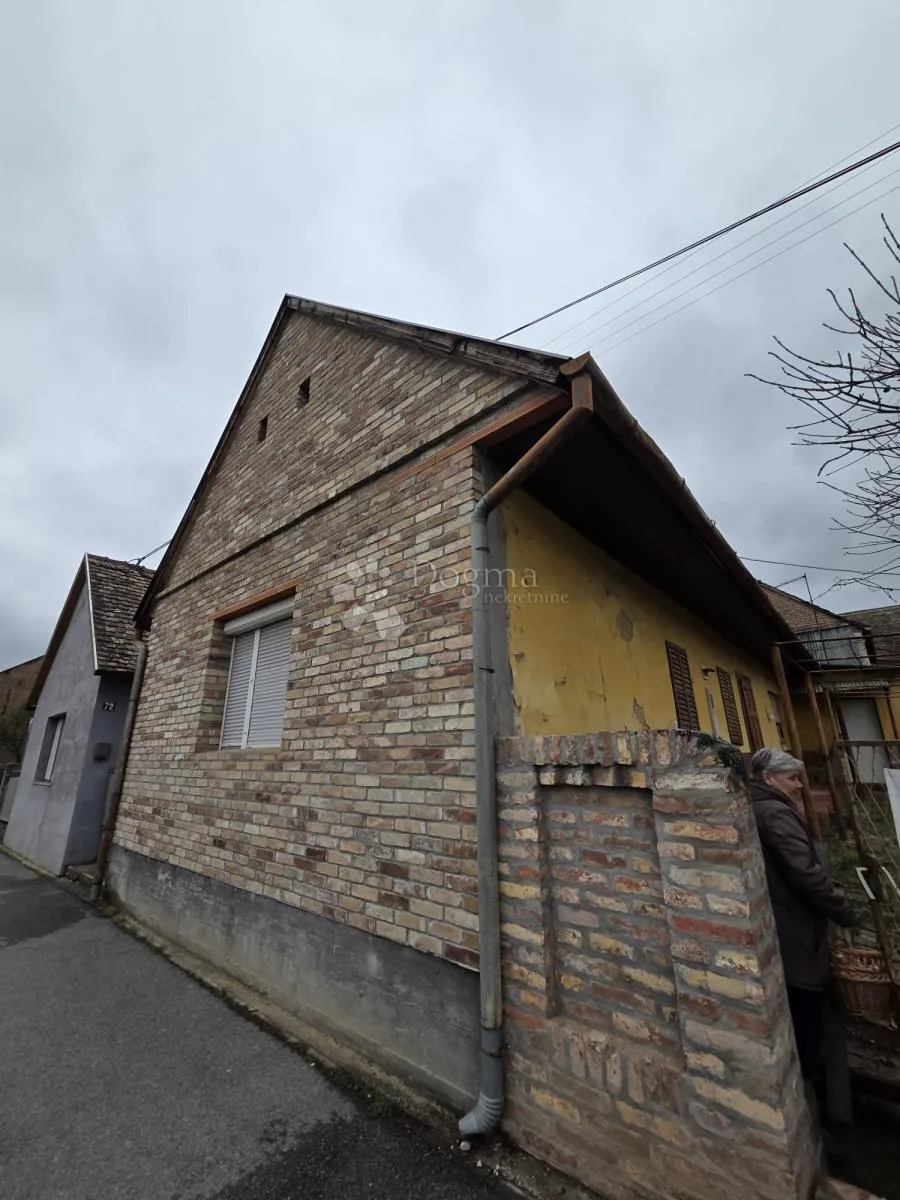 kuća s gospodarskim zgradama – odlična lokacija - slika 1