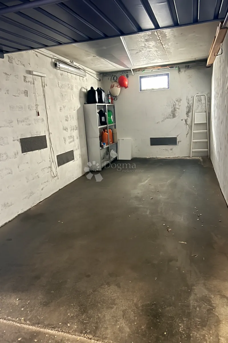dvoetažni apartman sa garažom - slika 15