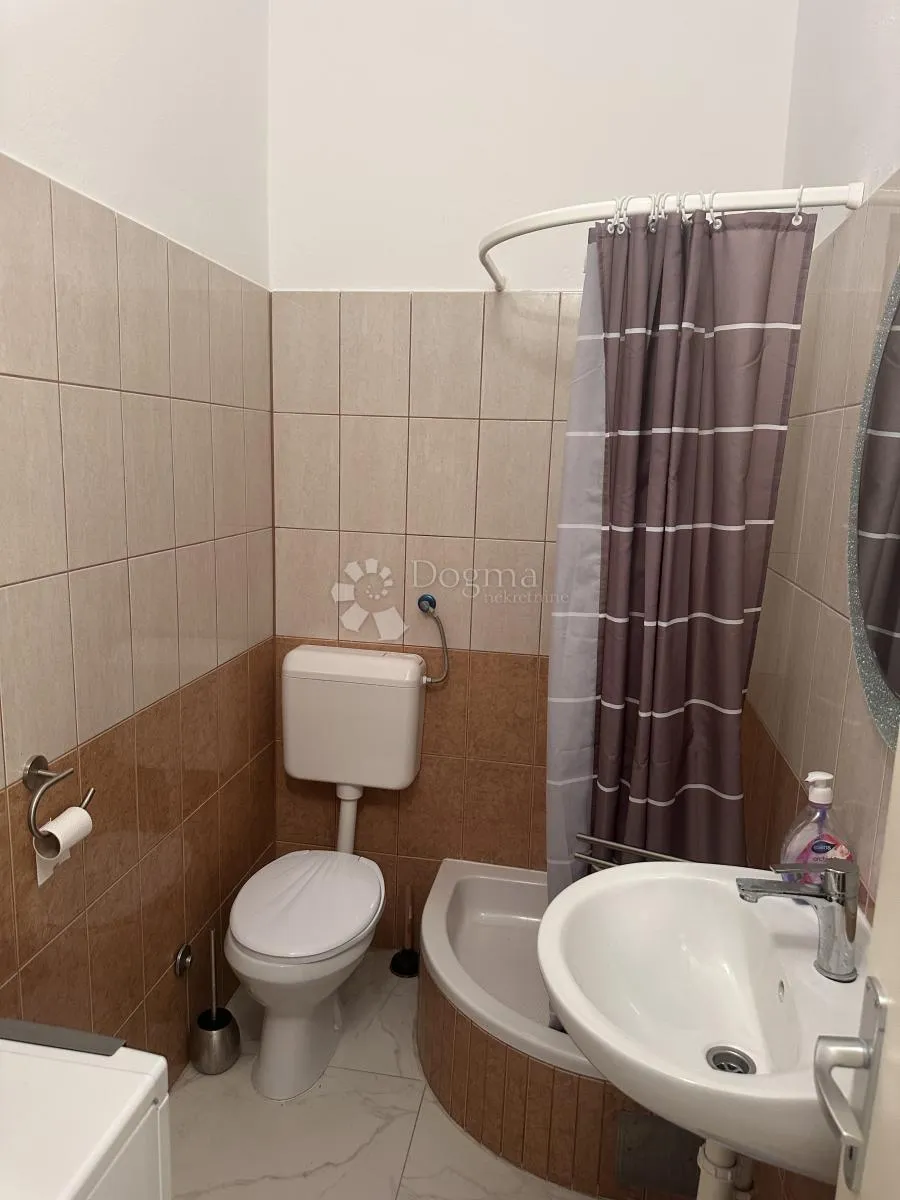 vir kuća sa 8 apartmana uhodana u posao sa turizmom - slika 34