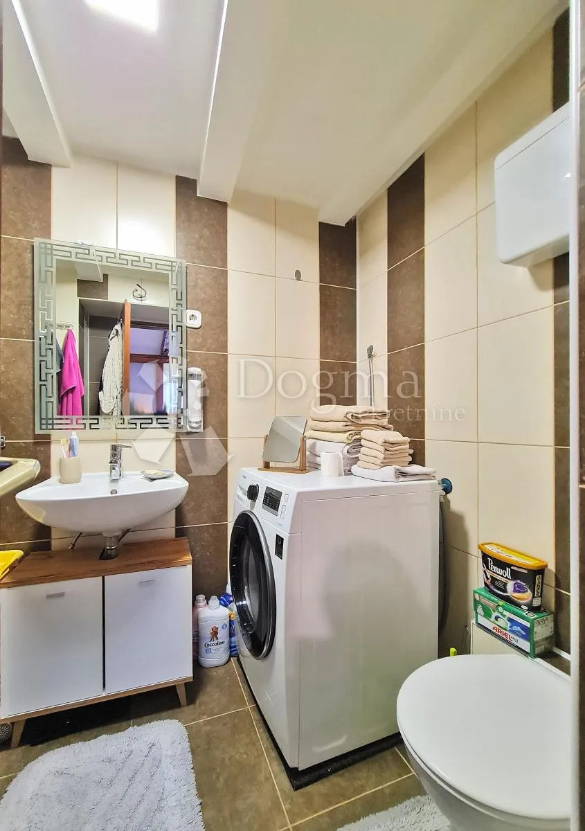 tri apartmana u srcu grada - slika 28