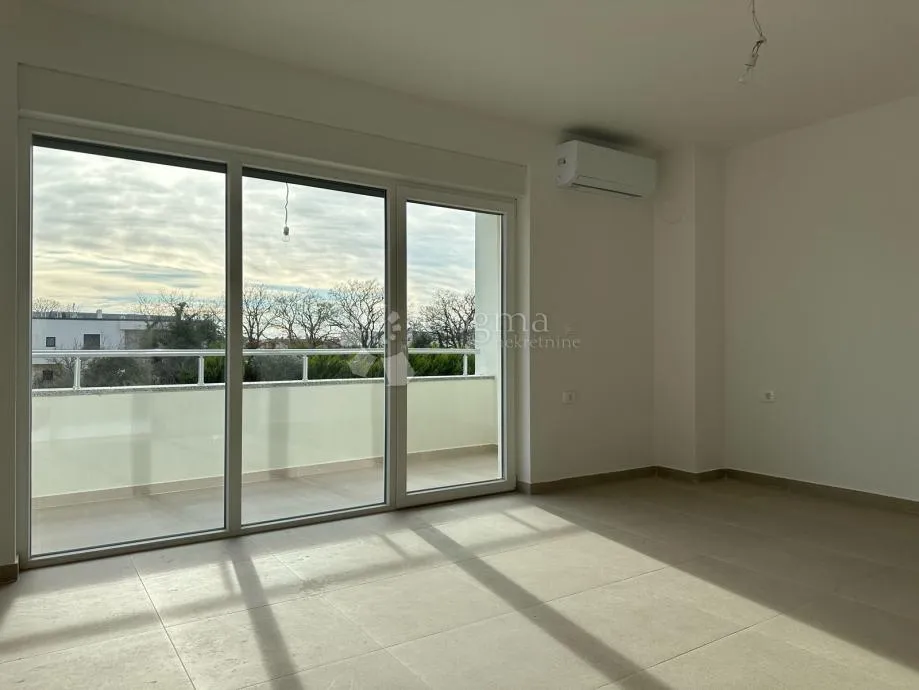 moderni 2-sobni stan u novogradnji, 800 m od mora - slika 7