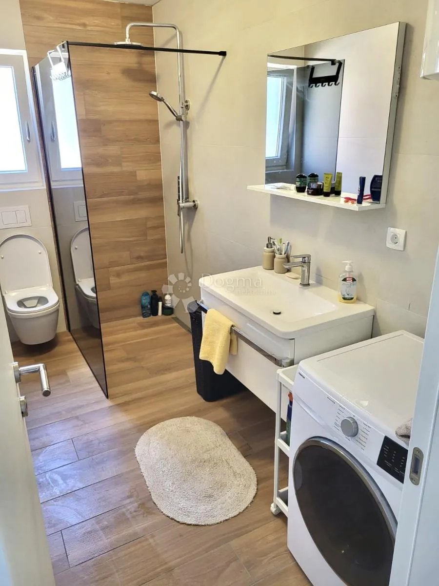 sofisticirana kuća - novogradnja s tri kategorizirana apartmana - slika 8