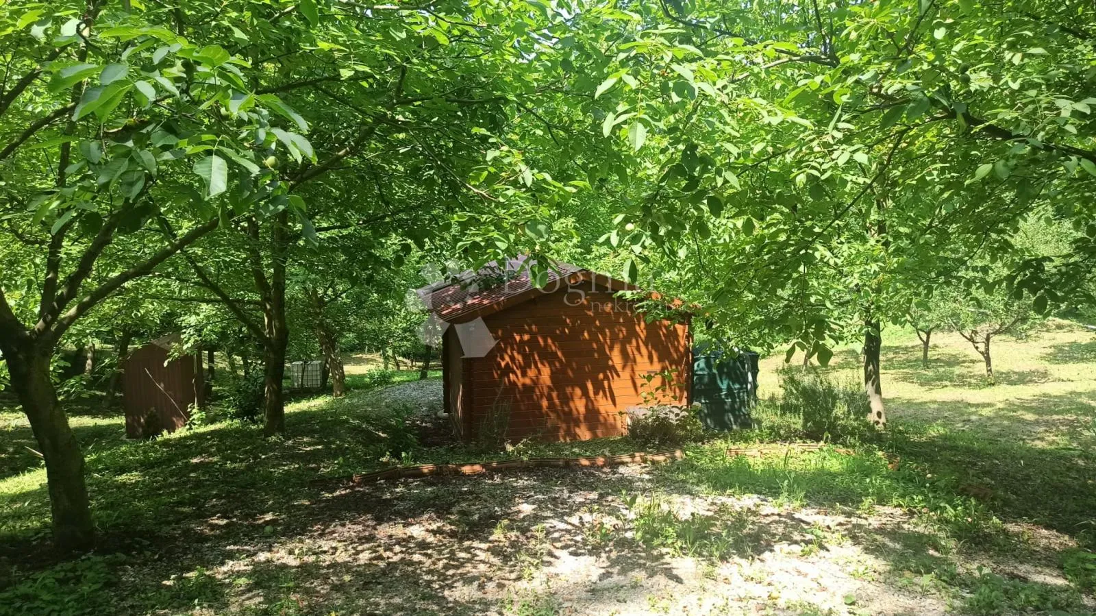zemljište sa kućicom i spremištem, te wc-om nadomak zaboka - slika 53