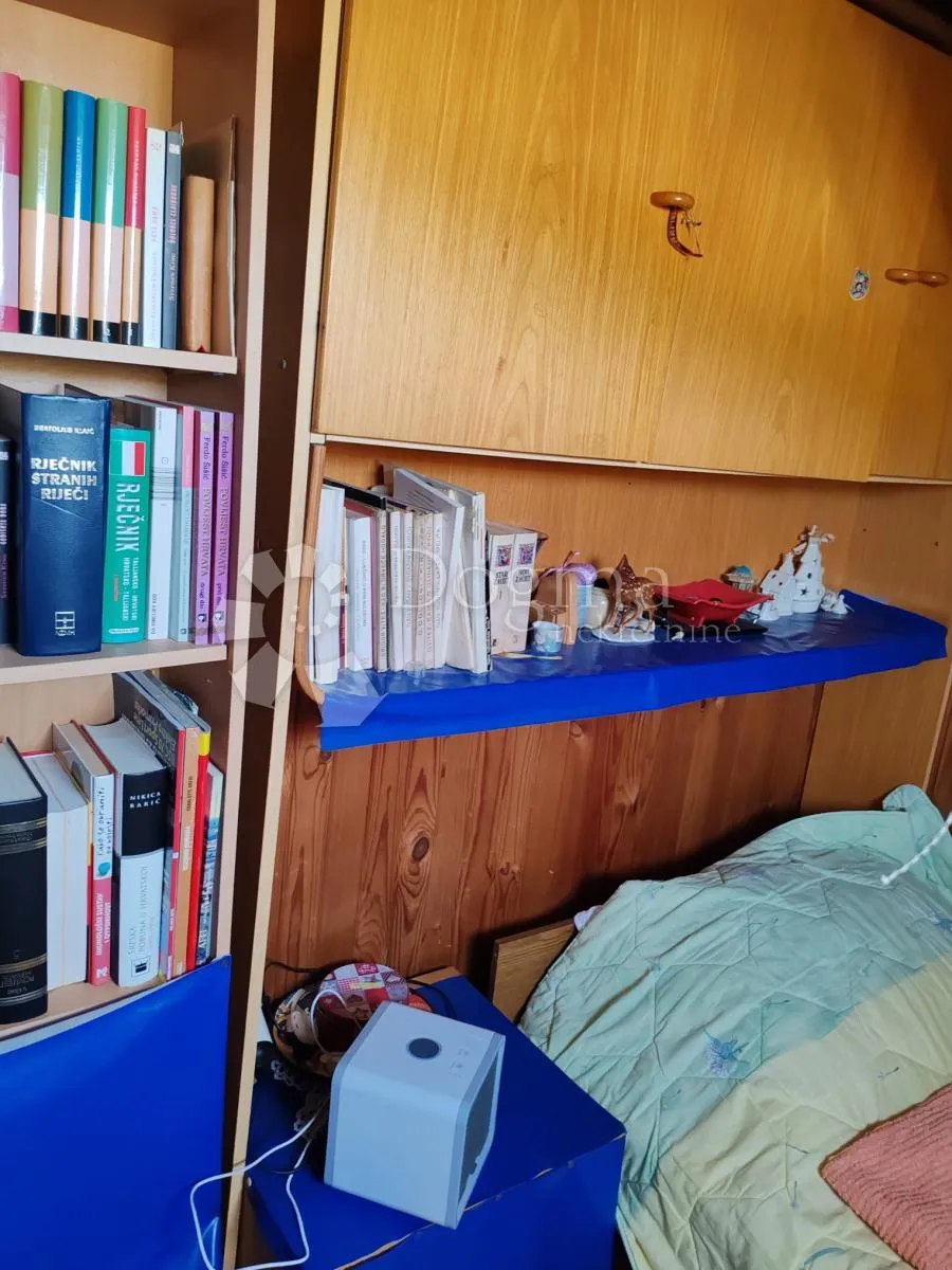 kuća sa tri stana i poslovnim prostorom - slika 39