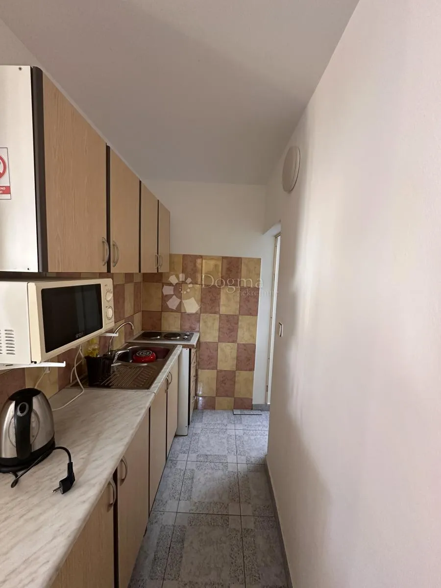 vir kuća sa 8 apartmana uhodana u posao sa turizmom - slika 25