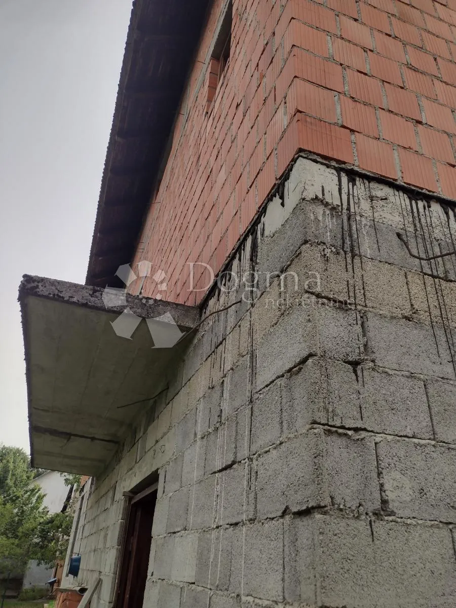 novogradnja s poslovnim prostorom - slika 10