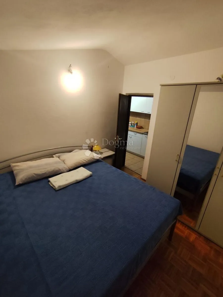 kuća u centru jezera - slika 4