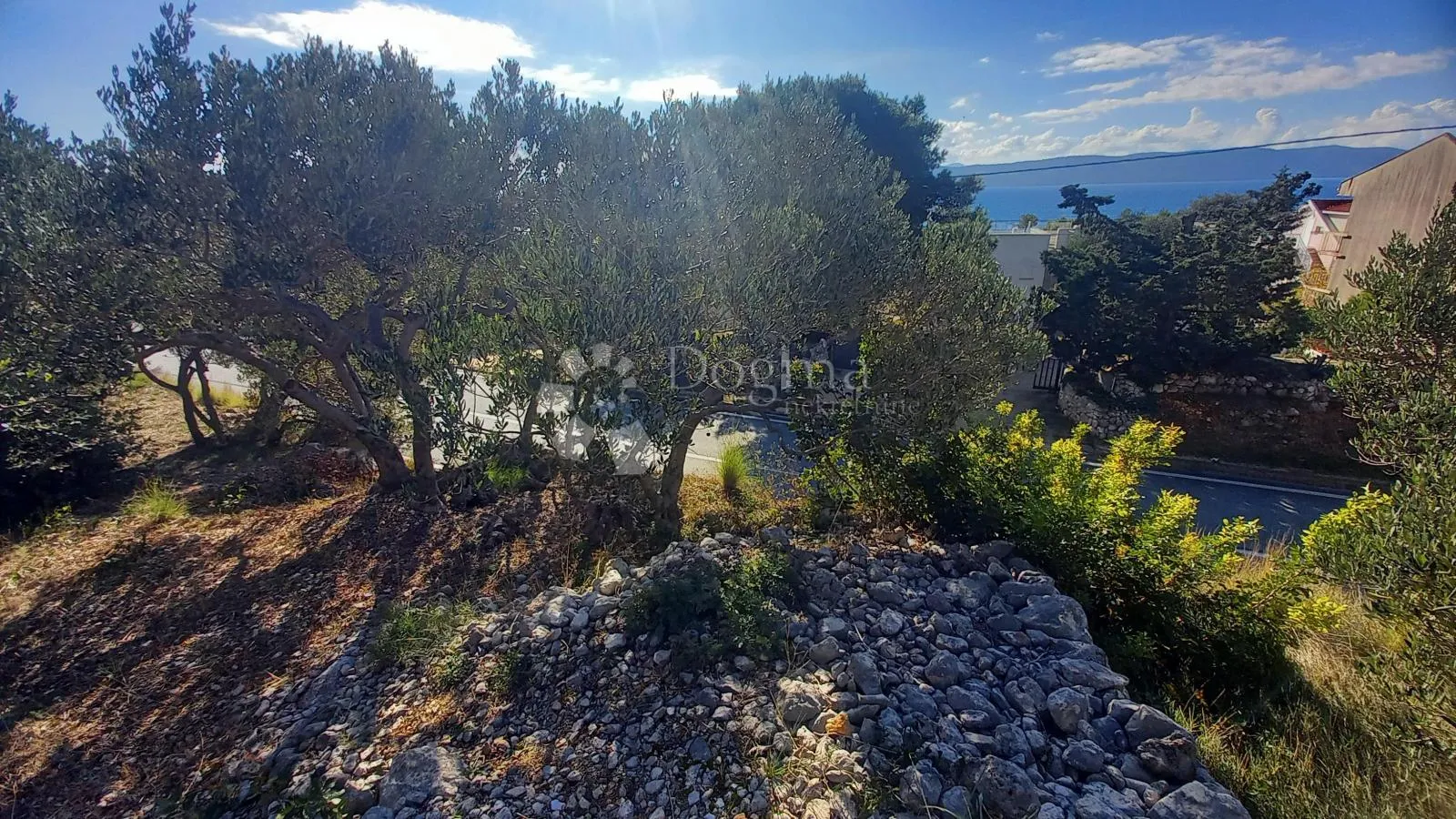 građevinsko zemljište uz magistralu 604m2 živogošće - slika 11