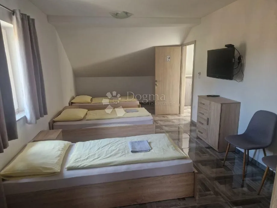 poslovno-stambeni objekt u sisku s poslovnim prostorom - slika 10