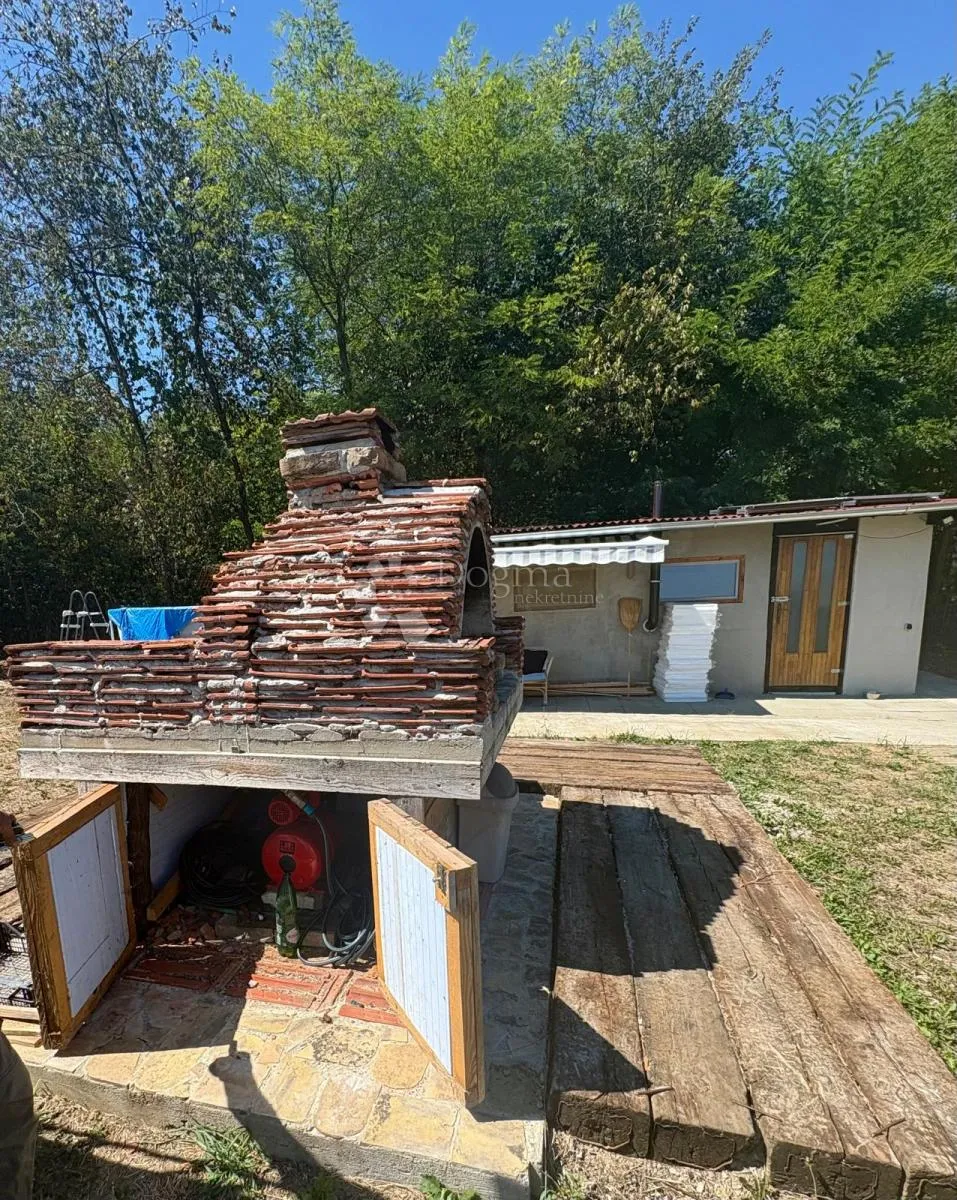 oaza mira uz karašicu – vikendica na velikoj parceli - slika 8