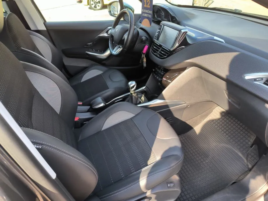 peugeot 2008 1,6 e-hdi 115 ks, servisna, v. servis, jamstvo, reg. 1 g. - slika 13