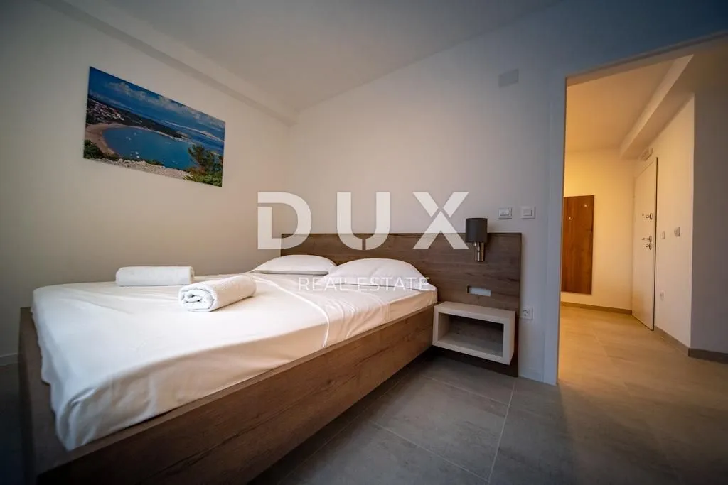 otok rab, lopar - luksuzna vila smještena uz pješčani raj - slika 37