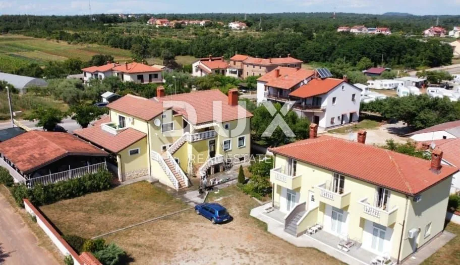 istra, umag - poslovni objekt sa stanom - slika 40