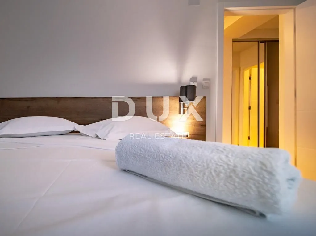 otok rab, lopar - luksuzna vila smještena uz pješčani raj - slika 35