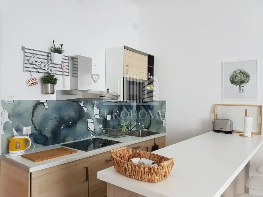 centar, dvoetažni stan 137m2, 3 apartmana - slika 10