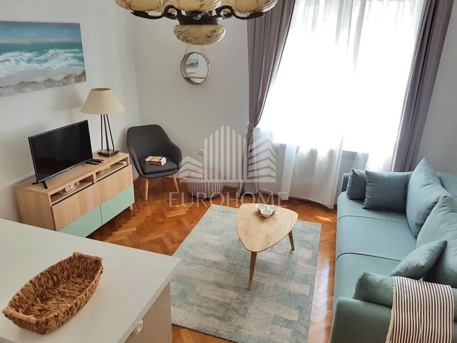centar, dvoetažni stan 137m2, 3 apartmana - slika 9