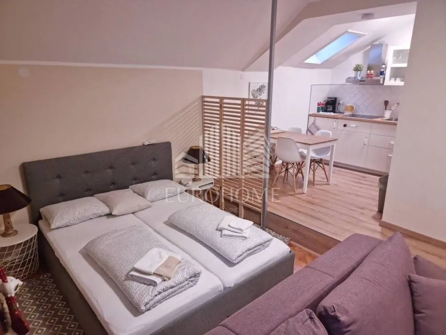 centar, dvoetažni stan 137m2, 3 apartmana - slika 5