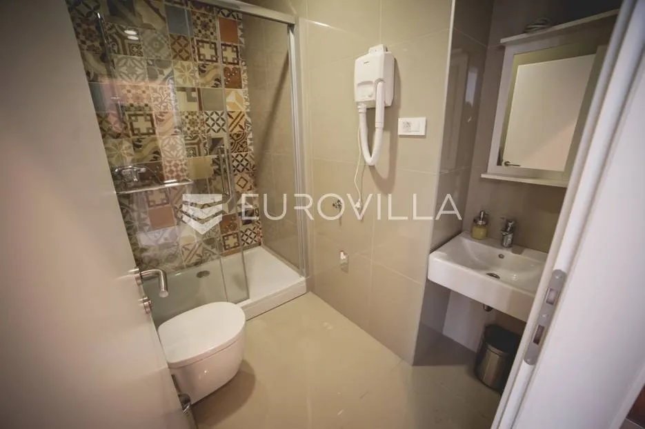 centar stan 205m2 podijeljen na 5 apartmana i sobu - slika 7
