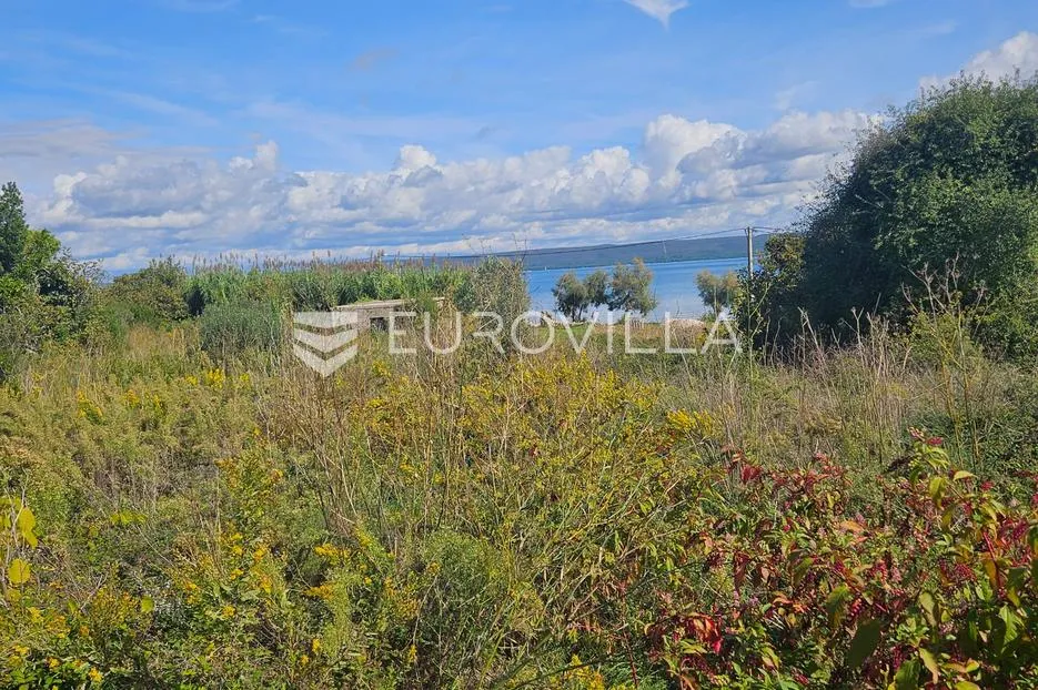 Pašman, Banj, građevinsko zemljište površine 723m2 na top lokaciji, odmah uz more - Banj, Pašman