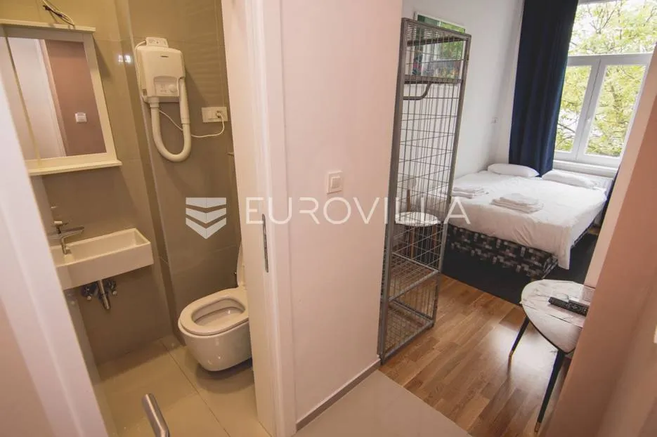 centar stan 205m2 podijeljen na 5 apartmana i sobu - slika 2