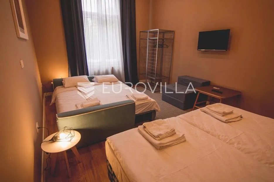 centar stan 205m2 podijeljen na 5 apartmana i sobu - slika 20