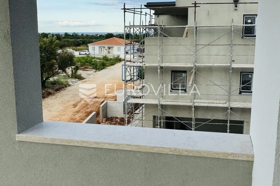 istra, umag, novogradnja, stan na drugom katu 64,54 m² - slika 11