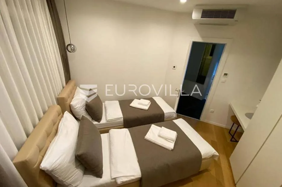 opatija, centar, moderno uređen trosoban stan nkp 85 m2 - slika 5
