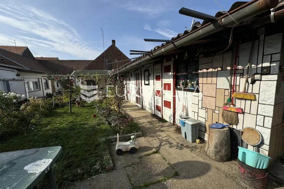 đakovo, centar, prostrana kuća sa dva stana i dvorištem 1018 m2 - slika 17