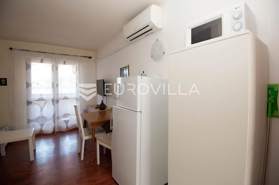 tisno, ekskluzivna apartmanska kuća prvi red do mora s panoramskim pogledom i brodicom - slika 42