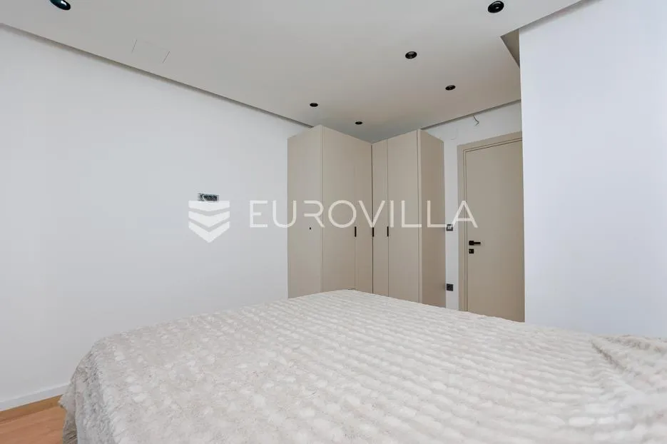 njivice, otok krk, dvoetažni stan u novogradnji s bazenom površine 104.45 m² - slika 7