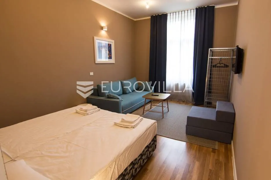 centar stan 205m2 podijeljen na 5 apartmana i sobu - slika 9