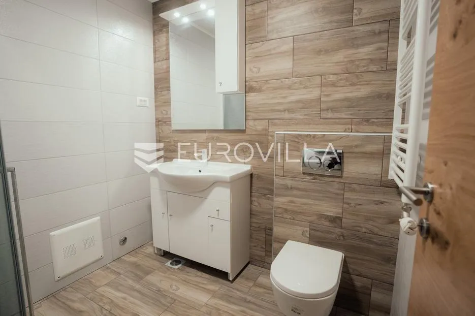vukovar, centar, novouređen poslovni prostor 106 m², odlična lokacija - slika 15